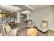 Inviting lobby with comfortable seating, modern lighting, and pool view at 2660 Peachtree Nw Rd # 14D, Atlanta, GA 30305