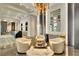 Beautiful lobby with unique chandelier, modern decor, and comfortable seating at 2660 Peachtree Nw Rd # 14D, Atlanta, GA 30305