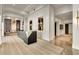 A modern lobby featuring a dark front desk, seating, and stylish decor at 2660 Peachtree Nw Rd # 14D, Atlanta, GA 30305