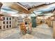 Unique locker room with decorative ceiling and floors, as well as classic wooden tables and chairs at 2660 Peachtree Nw Rd # 14D, Atlanta, GA 30305