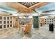 Unique locker room with decorative ceiling and floors, as well as classic wooden tables and chairs at 2660 Peachtree Nw Rd # 14D, Atlanta, GA 30305