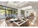 Relaxing lounge space boasting comfortable seating, contemporary decor, and large windows overlooking the pool at 2660 Peachtree Nw Rd # 14D, Atlanta, GA 30305