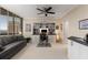 A bright office with custom built-ins, a desk, a comfortable couch, and expansive city views at 2660 Peachtree Nw Rd # 14D, Atlanta, GA 30305