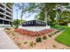 A beautifully landscaped entrance sign for Park Place on Peachtree at 2660 Peachtree Nw Rd # 14D, Atlanta, GA 30305
