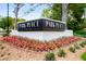 The Park Place on Peachtree community entrance sign surrounded by lush landscaping and flowers at 2660 Peachtree Nw Rd # 14D, Atlanta, GA 30305