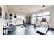 Onsite gym with treadmills, weight machines, and fitness accessories for residents at 112 Rogers St # 409, Atlanta, GA 30317
