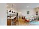 Spacious and bright living space with a kitchen island, modern furniture, and stylish decor at 112 Rogers St # 409, Atlanta, GA 30317