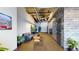 Comfortable lobby area featuring a couch, chairs, plants, and mailboxes at 112 Rogers St # 409, Atlanta, GA 30317
