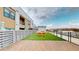 Rooftop terrace area featuring a stone fireplace, turf, lounge seating and community barbecue at 112 Rogers St # 409, Atlanta, GA 30317