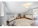 Bright Bedroom with white crib, changing table, large area rug, and ample natural light at 1265 Oldfield Rd, Decatur, GA 30030