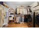 Custom walk-in closet complete with washer/dryer, hanging racks, shelves, and drawers at 1265 Oldfield Rd, Decatur, GA 30030