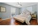 Serene bedroom with a plush bed, hardwood floors, and ample natural light, perfect for relaxing and unwinding at 1265 Oldfield Rd, Decatur, GA 30030