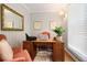 Home office featuring natural light, a comfortable chair, and a wooden desk providing the perfect space to work at 1265 Oldfield Rd, Decatur, GA 30030