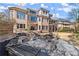 Charming backyard seating area with stone features perfect for relaxing or entertaining at 2046 Chambord Way, Snellville, GA 30078