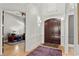 Bright and spacious foyer with hardwood floors, elegant double doors, and stylish decor at 2046 Chambord Way, Snellville, GA 30078