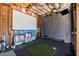 Large unfinished gym space featuring baseball training area and exposed ceiling at 2046 Chambord Way, Snellville, GA 30078