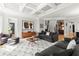 Spacious living area showcasing modern decor, recessed lights, and an eye-catching geometric rug at 2046 Chambord Way, Snellville, GA 30078