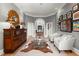 Charming living room with hardwood floors, neutral paint, and classic decor at 2046 Chambord Way, Snellville, GA 30078