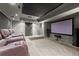 Home theater featuring leather seating, projector, carpet and a raised platform at 2046 Chambord Way, Snellville, GA 30078