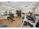 Well-equipped gym with cardio machines, weights, and mirrors for a complete workout experience at 6 Walnut Hill Nw Pl, Atlanta, GA 30318