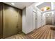 Hallway with carpet, base molding, and apartment doors at 2575 Peachtree Ne Rd # 8D, Atlanta, GA 30305