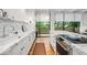 Bright kitchen features marble countertops and stainless steel appliances at 2575 Peachtree Ne Rd # 8D, Atlanta, GA 30305