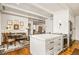 Bright kitchen with island and seating flows into living space, great for hosting at 2575 Peachtree Ne Rd # 8D, Atlanta, GA 30305
