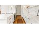 Kitchen features white cabinets, stainless steel appliances, and marble countertops at 2575 Peachtree Ne Rd # 8D, Atlanta, GA 30305