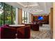 Community clubhouse lounge featuring chairs, accent lighting, and ample seating at 2575 Peachtree Ne Rd # 8D, Atlanta, GA 30305