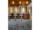 Bar with high-top seating, wood paneling, and carpeting at 2575 Peachtree Ne Rd # 8D, Atlanta, GA 30305