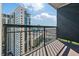 Relax on this spacious balcony with beautiful city views and sleek railings, perfect for outdoor enjoyment at 3481 Lakeside Ne Dr # 2303, Atlanta, GA 30326