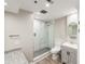 Renovated bathroom featuring granite countertop, a glass shower, and modern fixtures at 3481 Lakeside Ne Dr # 2303, Atlanta, GA 30326