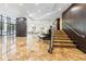 Grand building lobby with marble floors, elegant staircase, and comfortable seating for a luxurious entrance at 3481 Lakeside Ne Dr # 2303, Atlanta, GA 30326
