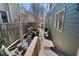 A cozy backyard patio with comfortable seating, an outdoor grill, and mature trees at 1564 Spring Se St, Smyrna, GA 30080