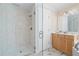 Elegant bathroom with a glass-enclosed shower and marble accent tiles at 1564 Spring Se St, Smyrna, GA 30080