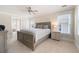 Comfortable bedroom with a ceiling fan, bedside table, and carpeted floors at 1564 Spring Se St, Smyrna, GA 30080