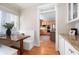 Cozy breakfast nook with bench seating, a wooden table, and a view into the bright kitchen at 1564 Spring Se St, Smyrna, GA 30080