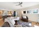 Open-concept living room with fireplace, built-ins, hardwood floors and seamless flow to kitchen at 1564 Spring Se St, Smyrna, GA 30080
