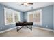 Office with a modern desk, neutral carpet, and natural light creating a functional and bright workspace at 1564 Spring Se St, Smyrna, GA 30080