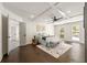 Spacious main bedroom featuring tray ceilings, hardwood floors, and natural light at 320 Woodlake Ct, Alpharetta, GA 30005