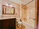 Cozy bathroom with vanity, shower, bathtub, and tile flooring at 326 Rockland Way, Lawrenceville, GA 30046