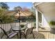 Enjoy this covered back porch with outdoor seating area, perfect for relaxing at 3772 Paces Ferry West Se, Atlanta, GA 30339