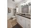 Bathroom with modern white vanity, dark countertops and tile floors at 3772 Paces Ferry West Se, Atlanta, GA 30339