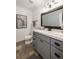 Stylish bathroom with modern vanity, shiplap wall, and elegant fixtures at 3772 Paces Ferry West Se, Atlanta, GA 30339