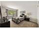 Cozy bedroom with a large glass sliding door that provides access to the outdoors at 3772 Paces Ferry West Se, Atlanta, GA 30339