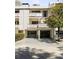 Townhouse complex with black garages and multiple balconies at 3772 Paces Ferry West Se, Atlanta, GA 30339