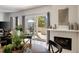 Living room with fireplace and sliders opening to private deck at 3772 Paces Ferry West Se, Atlanta, GA 30339