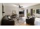 Spacious living room with large windows and access to a private balcony at 3772 Paces Ferry West Se, Atlanta, GA 30339