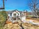 Front aerial view of new construction home with a concrete driveway at 5272 Poplar Springs Rd, Stone Mountain, GA 30083