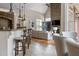 Open concept kitchen with stone arch, bar seating, and stainless appliances at 1035 Old Powers Ferry Rd, Atlanta, GA 30327